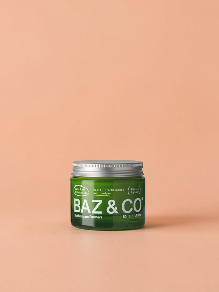 Baz & Co Skincare Skin Food Moisturiser in a green glass jar with a silver lid. 50ml.