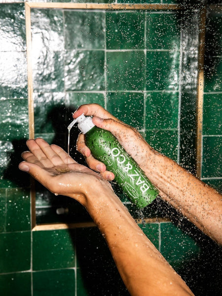 Baz & Co Skincare Restore and Awaken Body Wash with basil, grapefruit & spearmint, dispensed into hand.