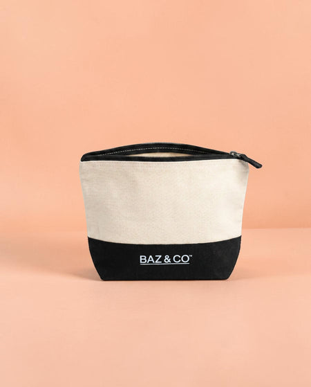 BAZ & Co Skincare canvas wash bag, natural canvas with black base and zip, for travel or bathroom storage.